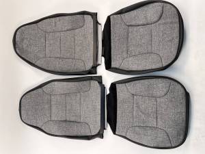 Front Bucket Seats (05V Black vinyl boxing &19T Charcoal tweed face)
